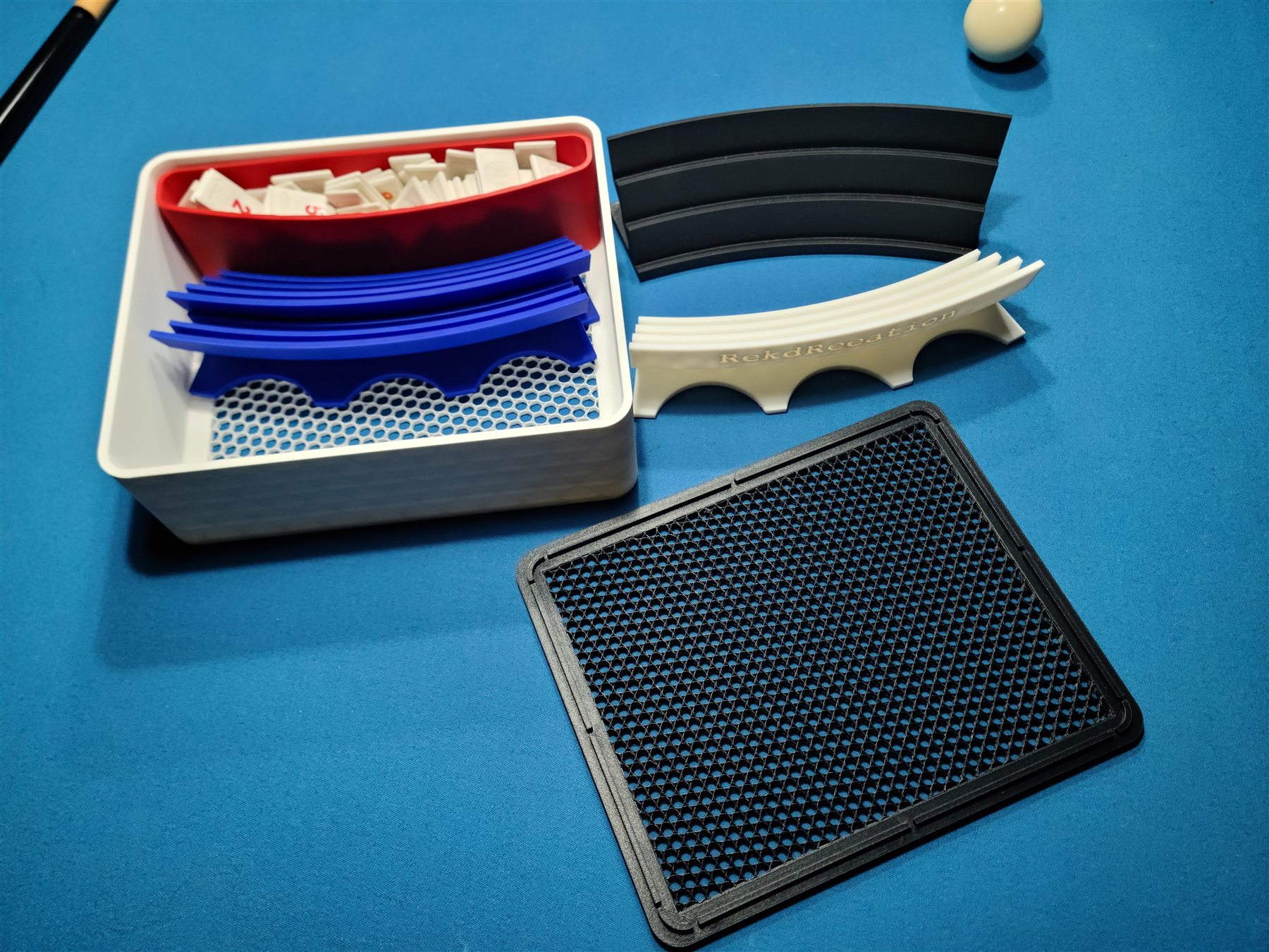MeldVault 4 storage box with four racks, storage troughs, loose tiles, and lid.
